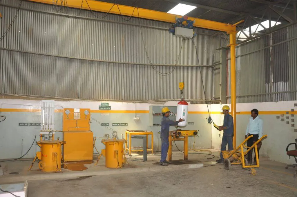 Technicians in the cylinder testing bay